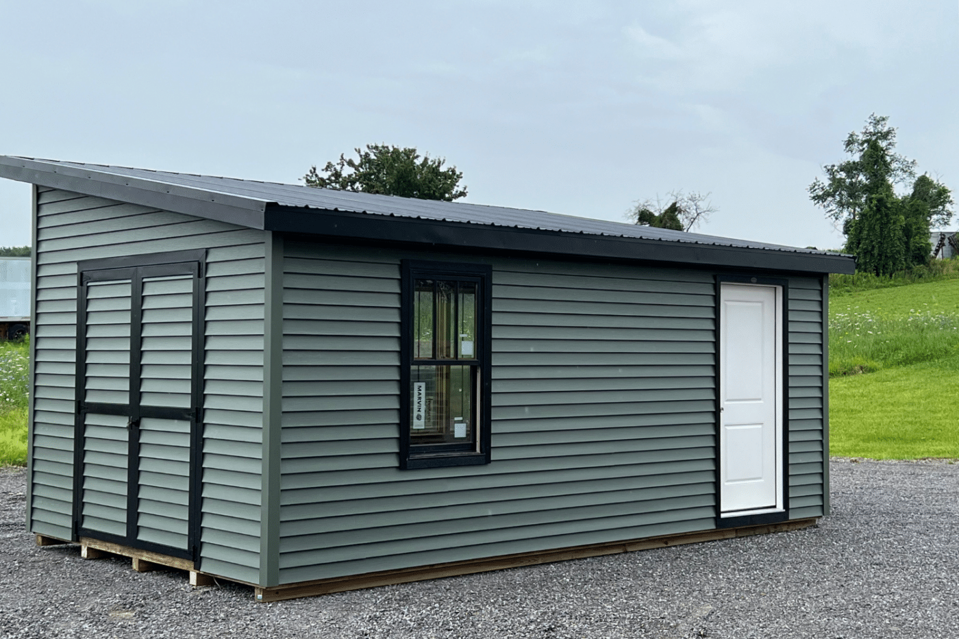 12x20 modern shed with moonlit moss vinyl siding in castile ny