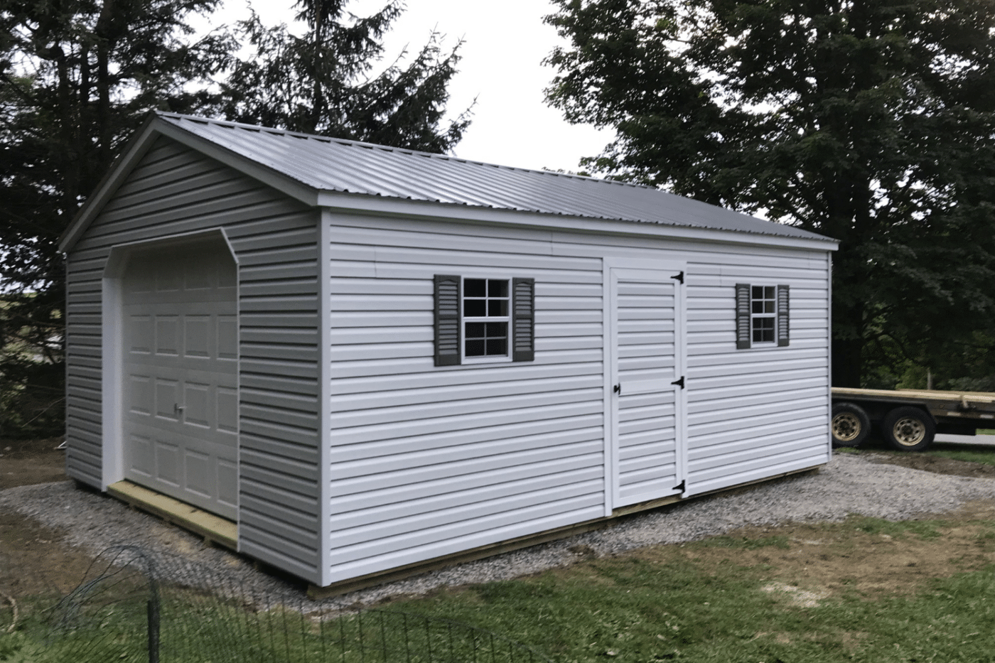 12x30 white garage with gray roof, windows, and door in new york