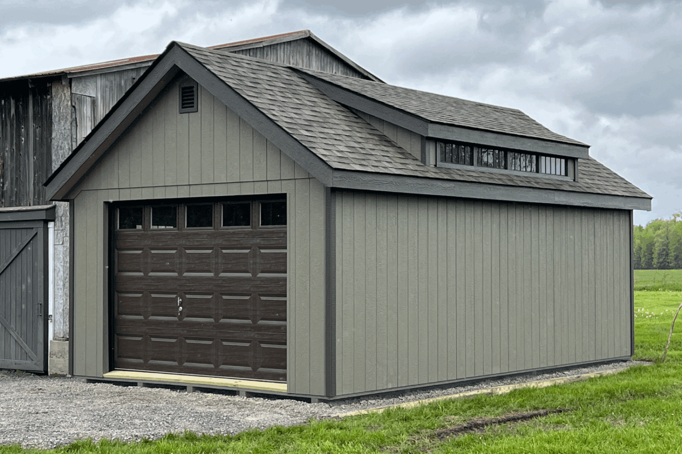 14x24 chalet garage in leicester ny with brown garage door