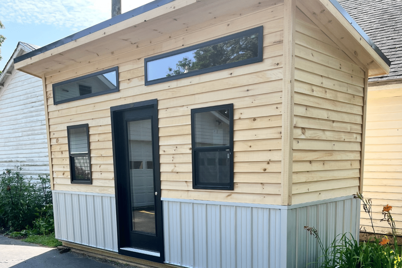 6x16 modern shed with black door and windows in mt morris ny