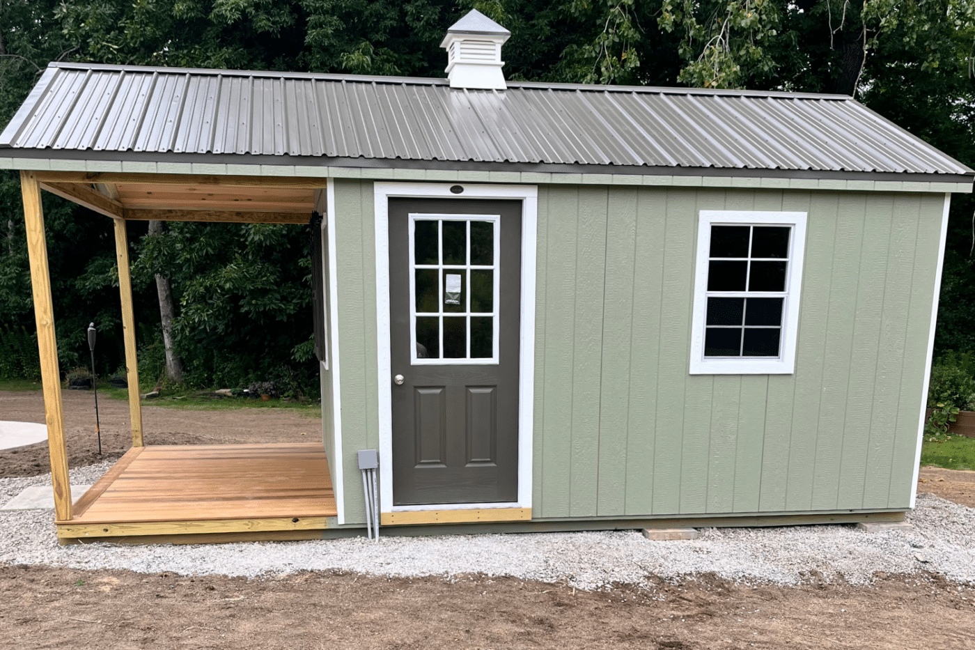 green 12x14 modern prefab cabin in new york with side door