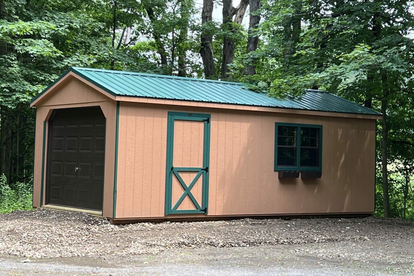 potters clay 12x24 cottage garage in Warsaw NY with ivy trim and metal roof and a brown garage door and flowers boxes