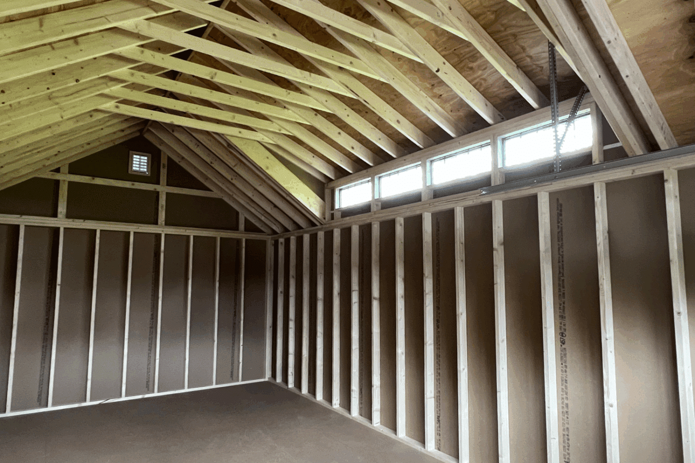 rear interior of 14x24 chalet garage in leicester ny