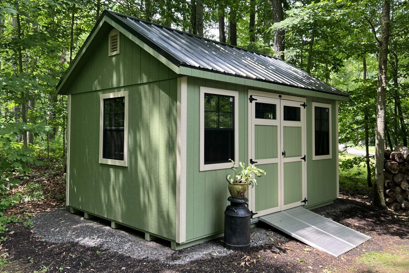 side view of garden vents and black side window on artichoke green 10x14 chalet shed in Warsaw NY